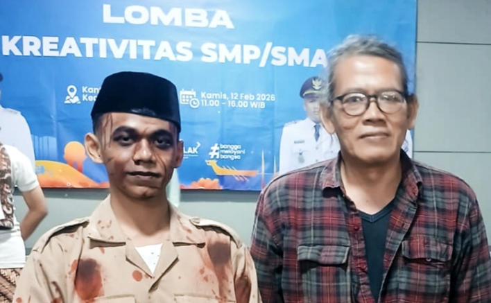 Yaumil Faathir Mubarok SMAN 9 Tangerang Juara 1 Lomba Puisi Kecamatan Pinang